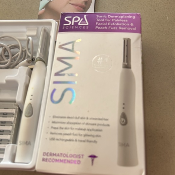 Spa Sciences Sima Sonic dermaplaning tool for painless facial exfoliation fuzz - Picture 2 of 3